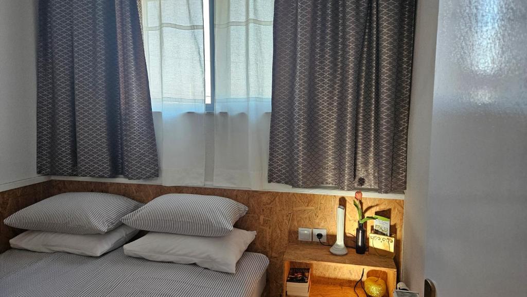 Postel nebo postele na pokoji v ubytování Studio apartman Gradna