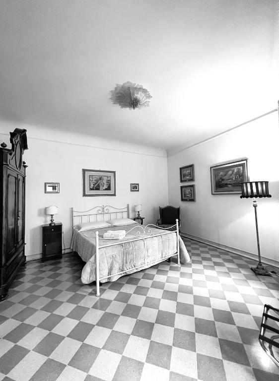 A bed or beds in a room at Atenea Luxury Suites - Atenea Collection
