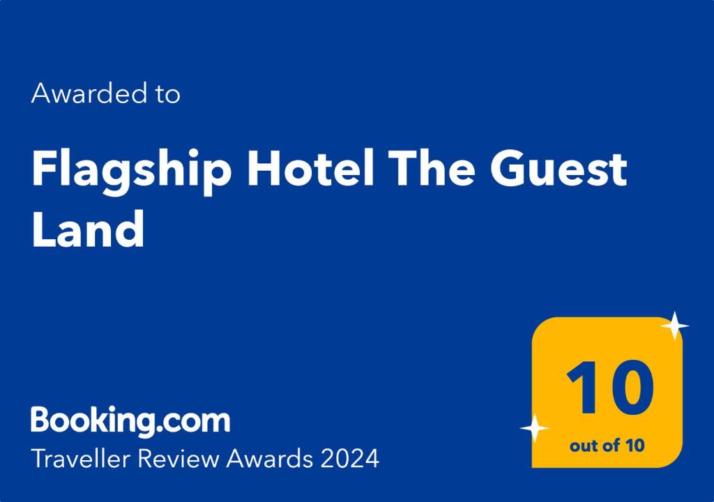 維沙卡帕特南的住宿－Flagship Hotel The Guest Land，黄色标志,读取宾客所住的法兰普特酒店
