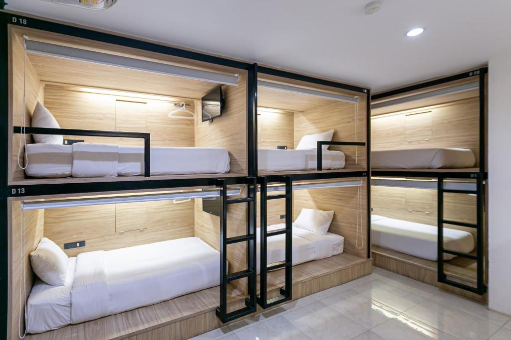 Ένα ή περισσότερα κρεβάτια σε δωμάτιο στο The Bedrooms Hostel Pattaya