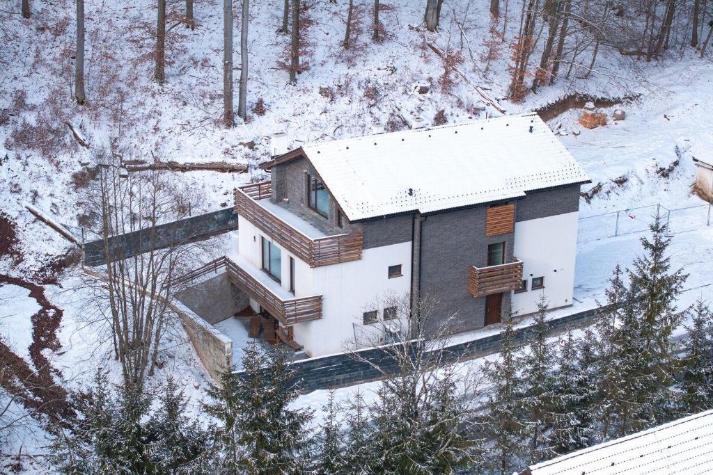 an aerial view of a house in the snow at Chalety Bystra in Horná Lehota