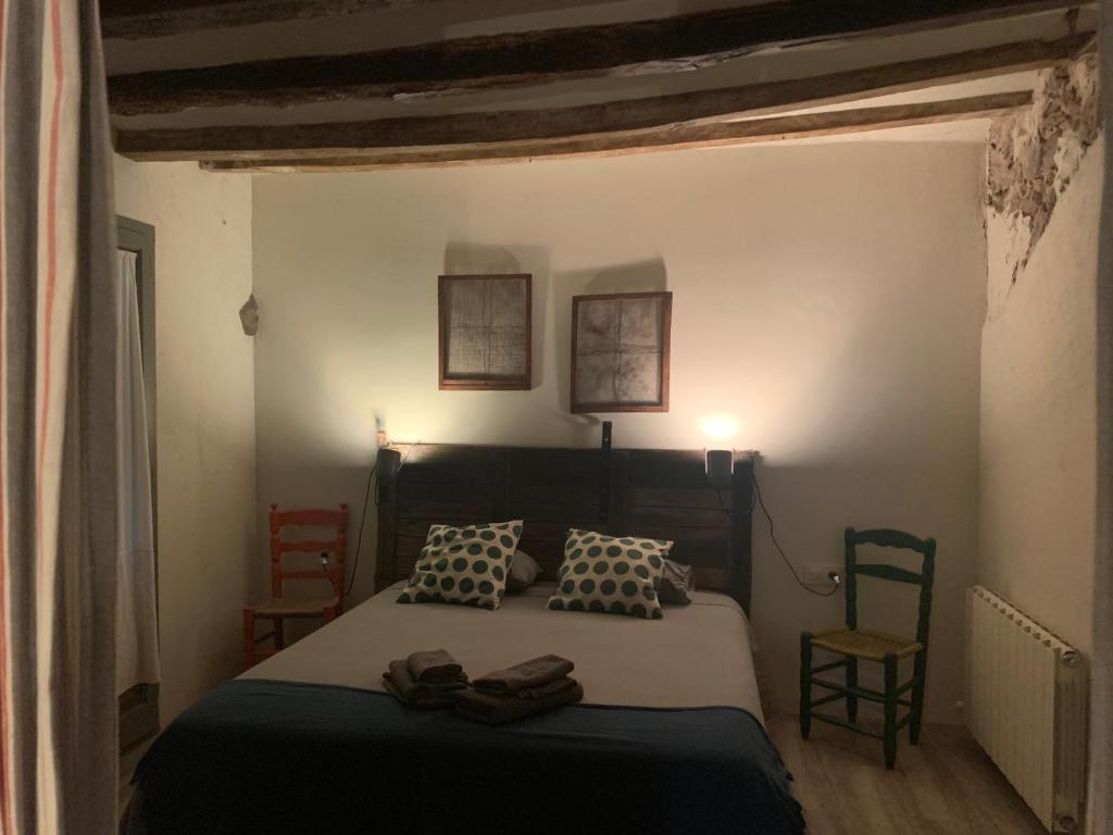 Postel nebo postele na pokoji v ubytování Allotjament Rural Mas Gingi