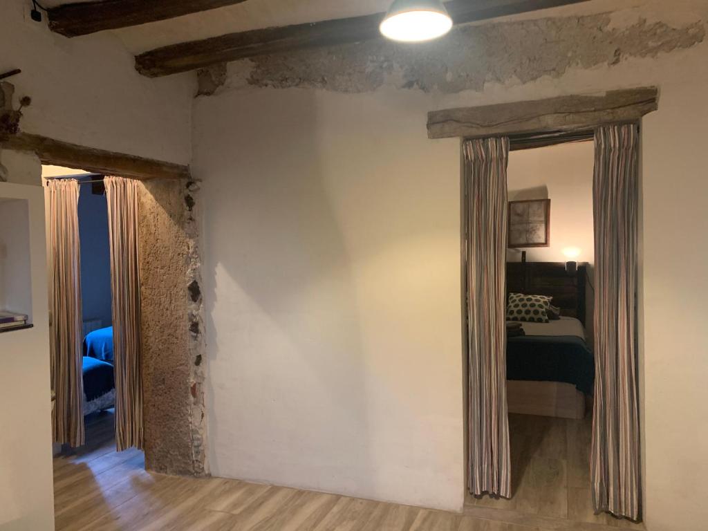 Postel nebo postele na pokoji v ubytování Allotjament Rural Mas Gingi