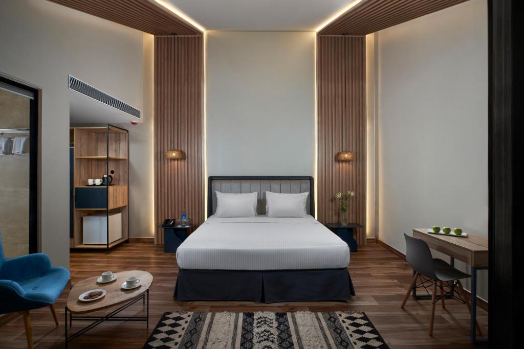 Postel nebo postele na pokoji v ubytování Avataara Resort & Spa