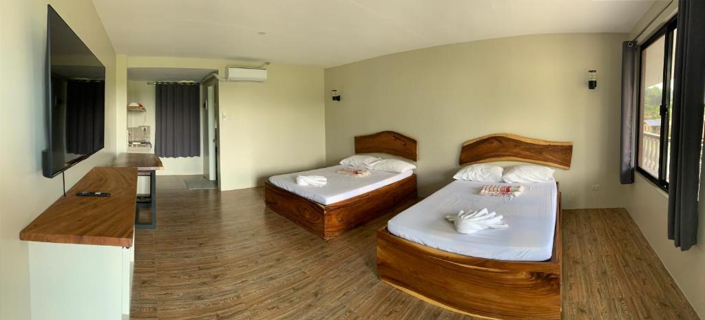 Postel nebo postele na pokoji v ubytování Lone Star Inn