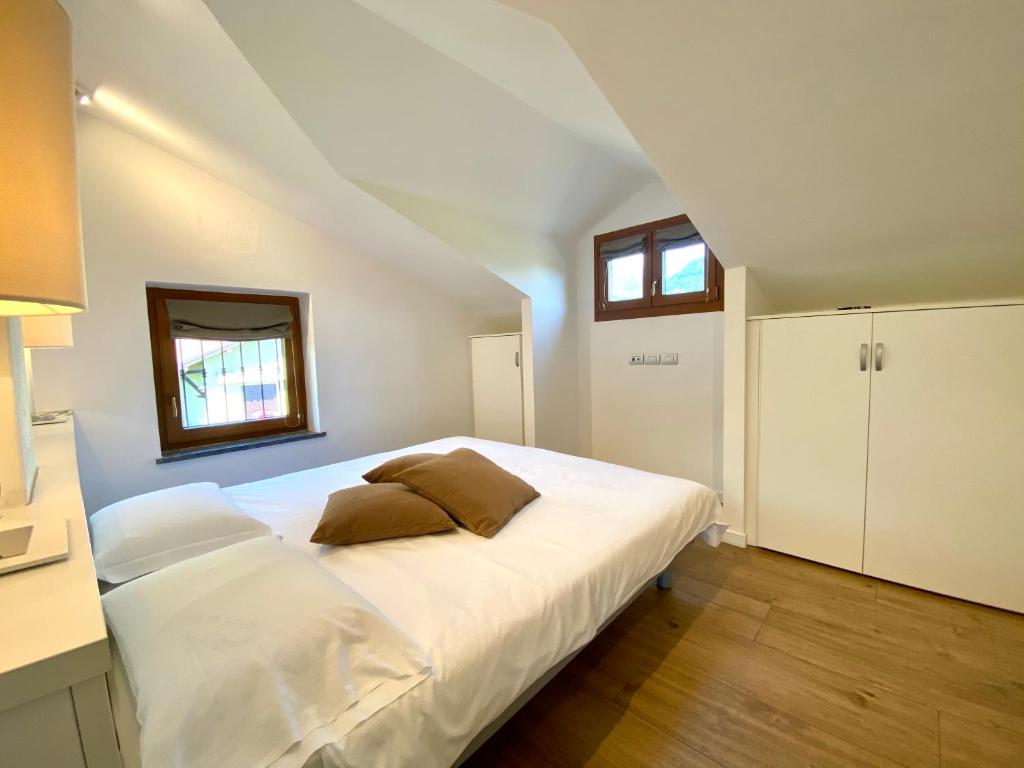 Postel nebo postele na pokoji v ubytování Vittoria Residence