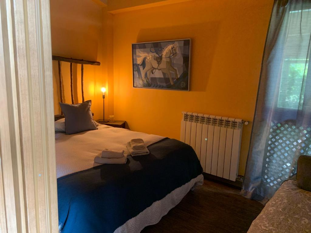 Postel nebo postele na pokoji v ubytování Allotjament Rural Mas Gingi