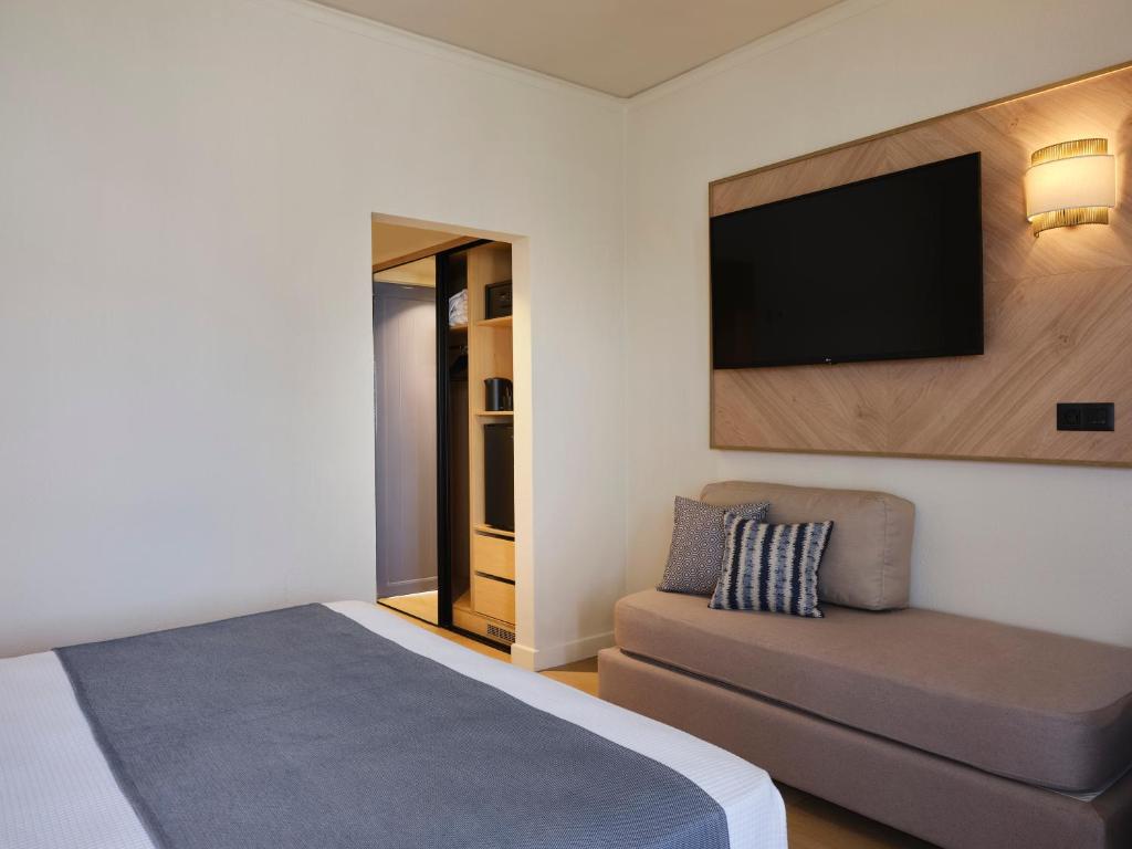 Postel nebo postele na pokoji v ubytování Atlantica Ocean Beach Resort