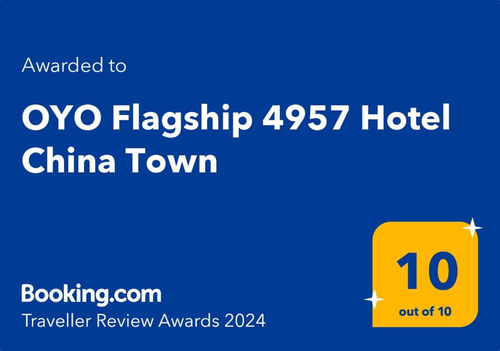 ein Bildschirmfoto eines Zeichens, das Oxo Flaggschiff Hotel China Town liest in der Unterkunft Super OYO Flagship 4957 Hotel China Town in Bhairaun Ghāt