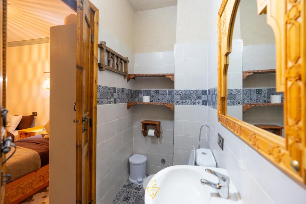 Koupelna v ubytování Riad Village