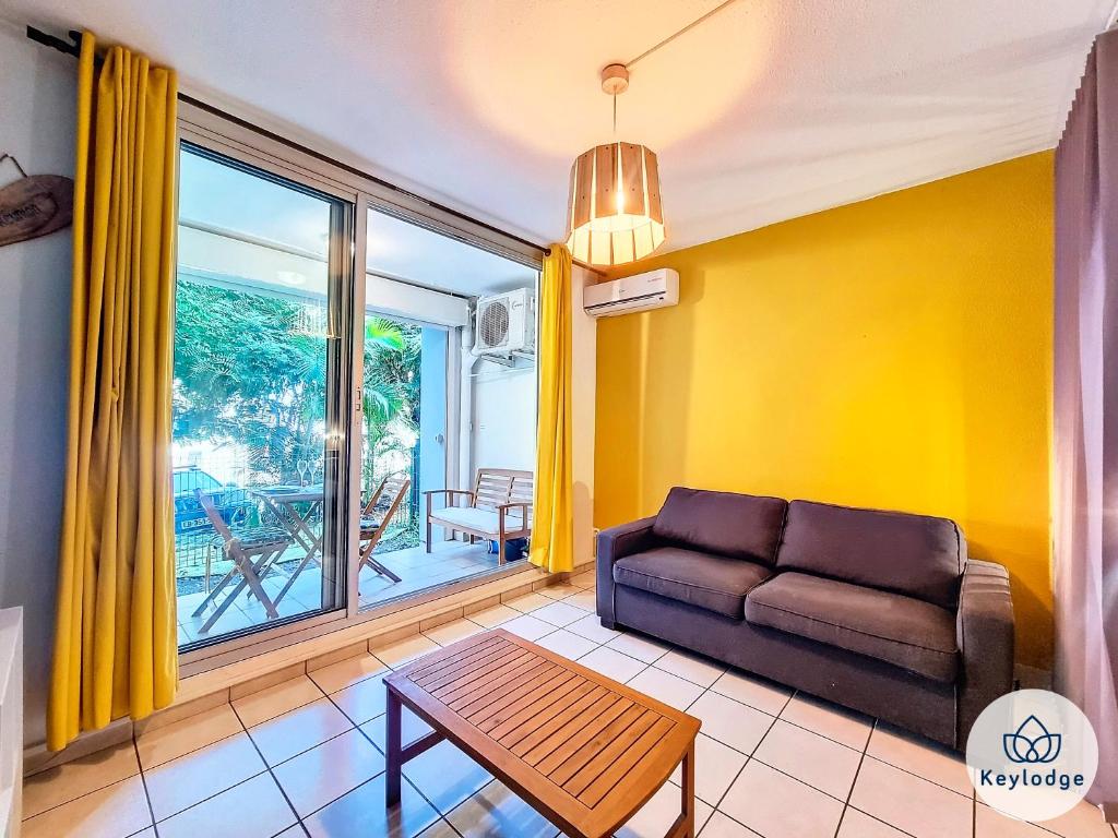 Χώρος καθιστικού στο T1- Leko Réunion 3 étoiles - Proche des plages de l'Ouest