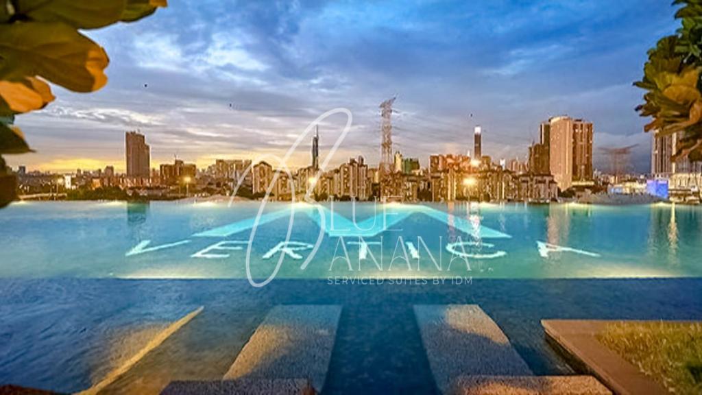 a view of a city skyline at night at M Vertica Premier Suites by BlueBanana in Kuala Lumpur