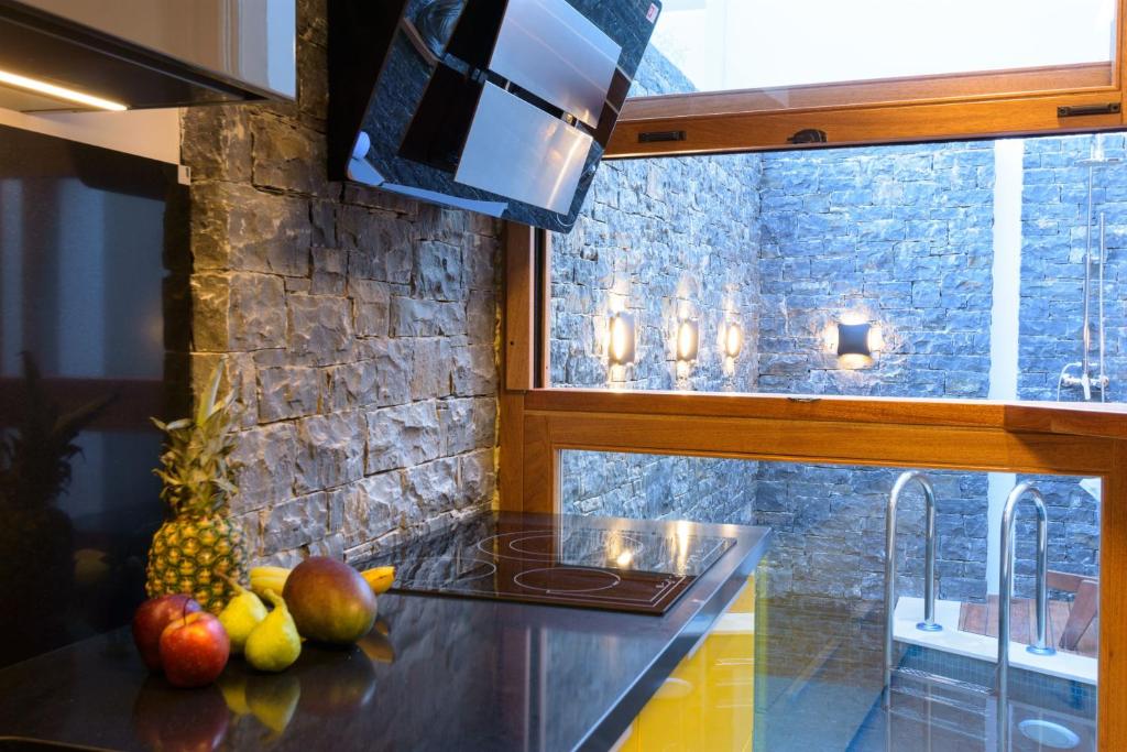 TV a/nebo společenská místnost v ubytování Casa di Plaka