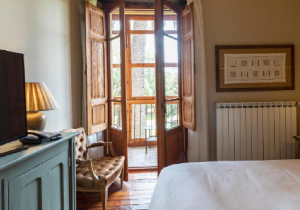 Postel nebo postele na pokoji v ubytování Posada Los Lienzos