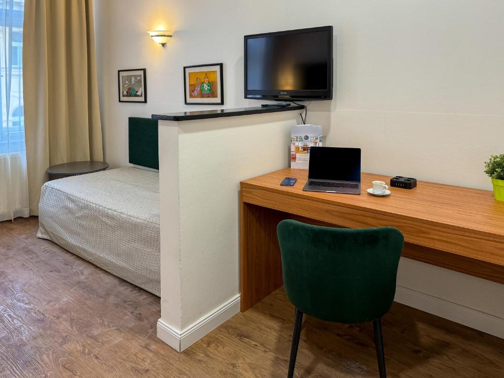 TV a/nebo společenská místnost v ubytování Hotel Malá Strana