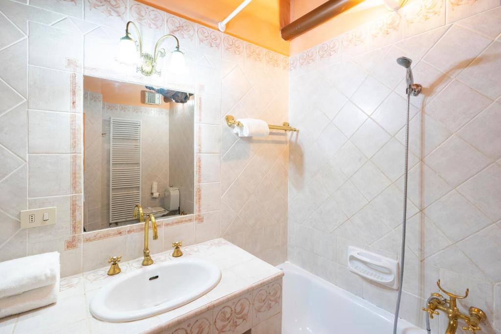 Kúpeľňa v ubytovaní Ruote Apartment first