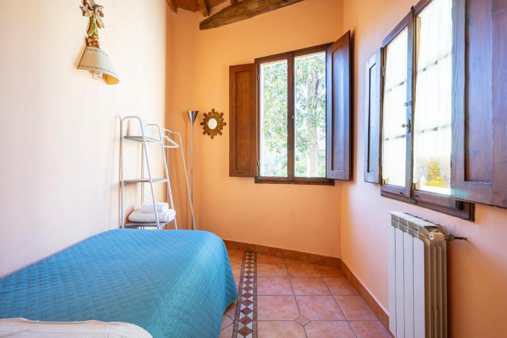 Posteľ alebo postele v izbe v ubytovaní Ruote Apartment first