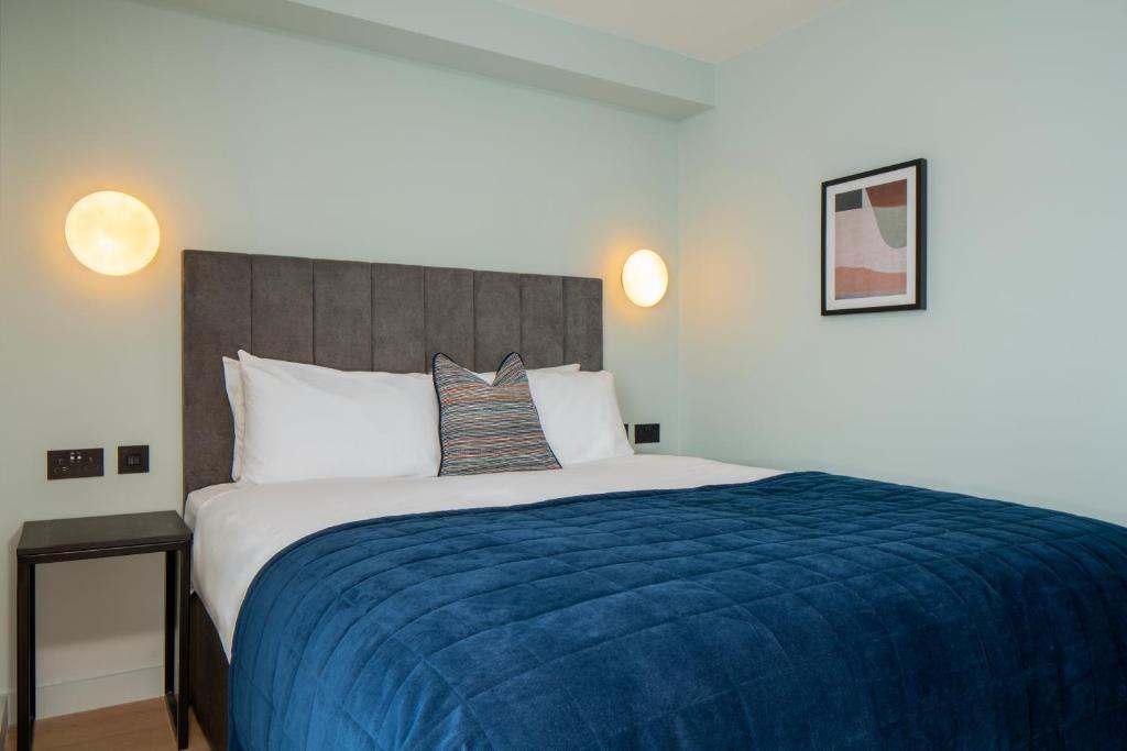 Postel nebo postele na pokoji v ubytování Aparthotel Birmingham