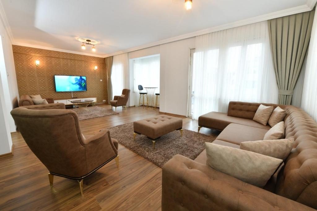 TV a/nebo společenská místnost v ubytování Dilek Apartments