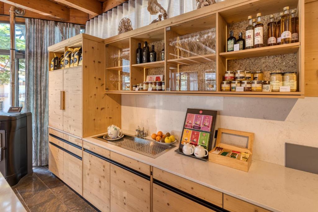 Kuchyň nebo kuchyňský kout v ubytování Hotel Martinelli