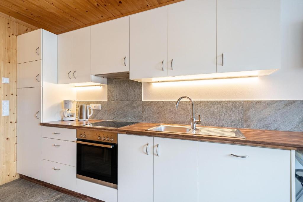 Kuchyňa alebo kuchynka v ubytovaní Seppnerhof Ferienwohnung Enzian