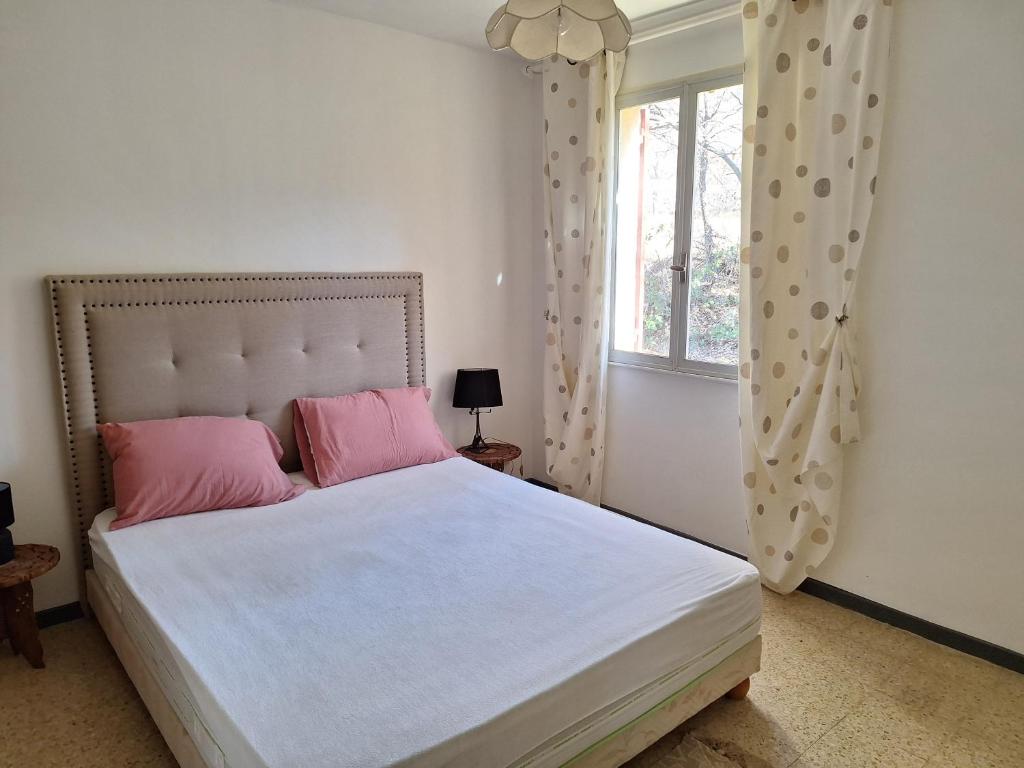 Postel nebo postele na pokoji v ubytování La Bastide des Cades