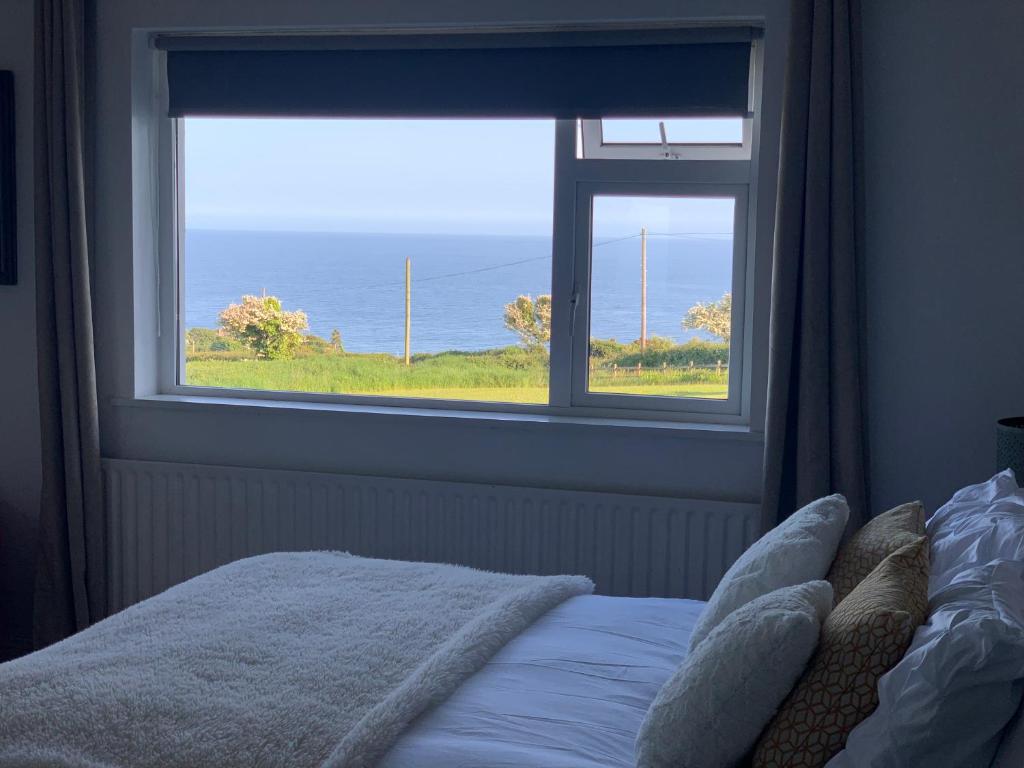 Voodi või voodid majutusasutuse Follies Suites Ballyvoile toas
