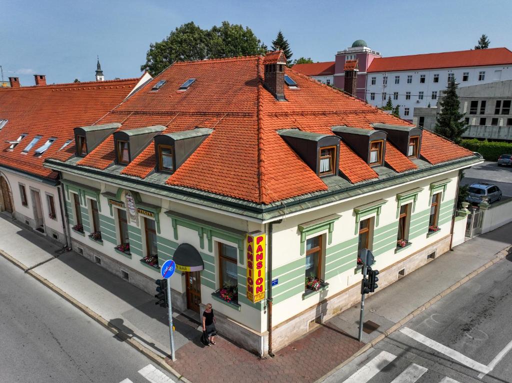 an overhead view of a building with an orange roof at Pansion Maltar Varaždin in Varaždin