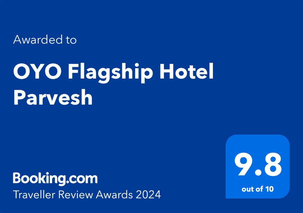 a blue sign that reads oxo flippibility hotel paverisk at Hotel Parvesh in Farrukhnagar