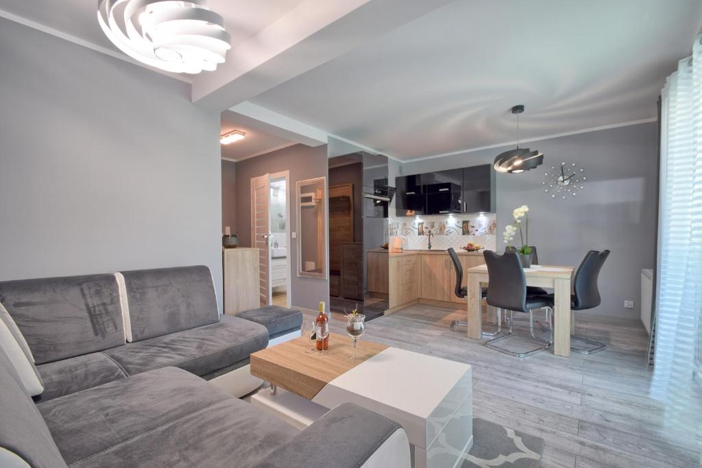O zonă de relaxare la Kolorowe Balkony Stylowy Apartament SeaView by Rent like home