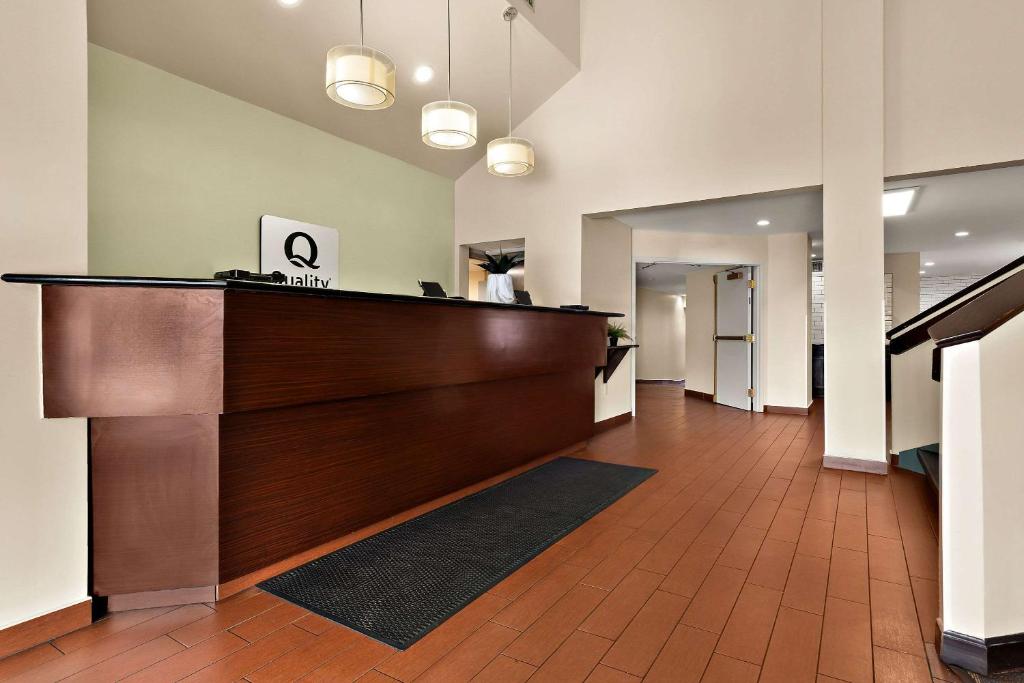 a lobby with a reception desk in a building at Quality Inn Memphis Northeast near I-40 in Memphis