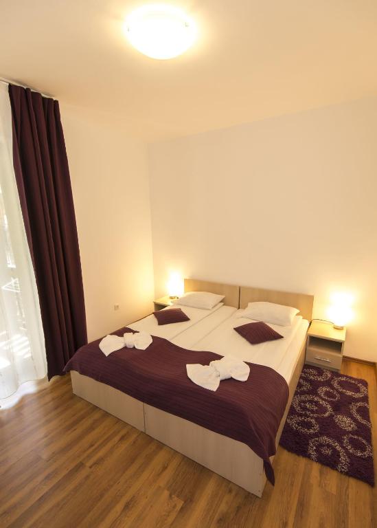 Postel nebo postele na pokoji v ubytování Vila Rigo Sovata