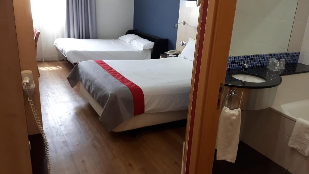 Postel nebo postele na pokoji v ubytování Holiday Inn Express Málaga Airport by IHG