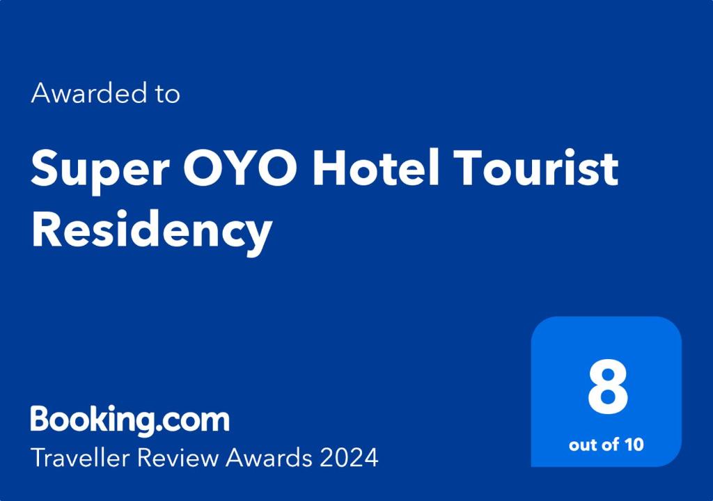 a blue sign that reads super oxo hotel tourist reliability at Super OYO Hotel Tourist Residency in Jaipur