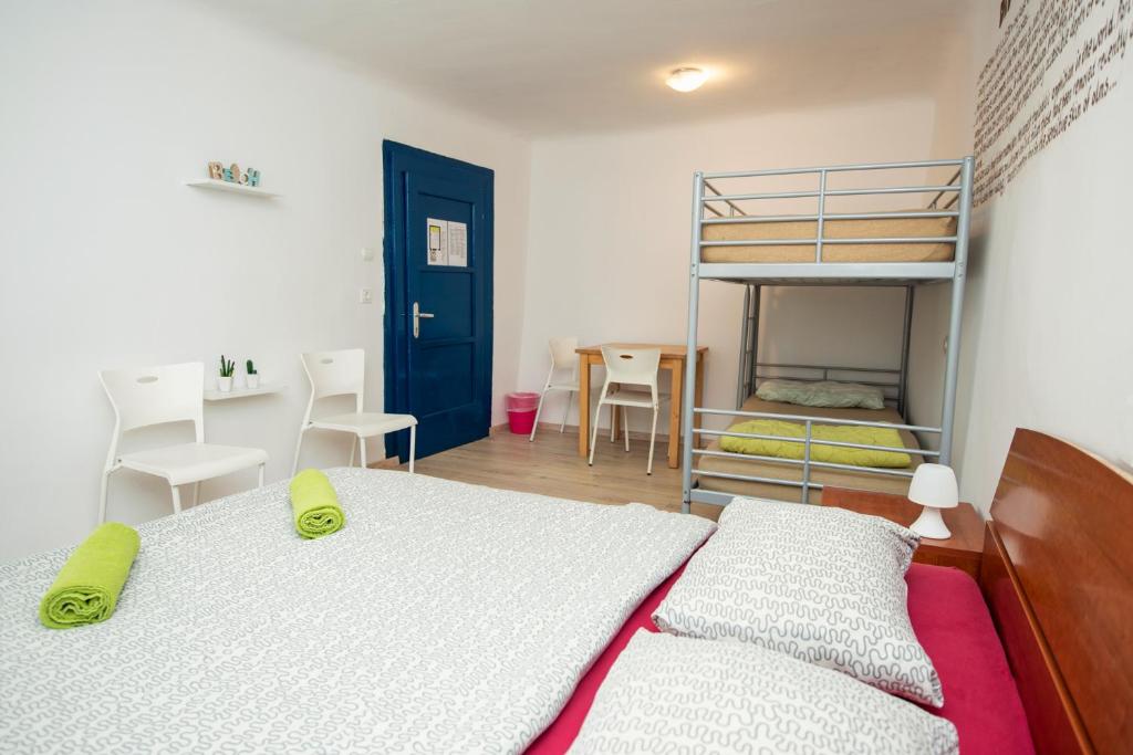 Postel nebo postele na pokoji v ubytování Alibi B11