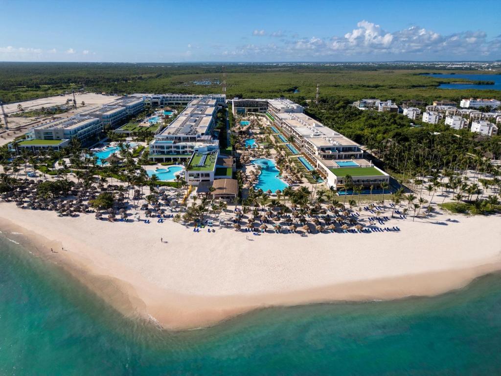 an aerial view of a resort on the beach at Serenade All Suites - Adults Only Resort in Punta Cana