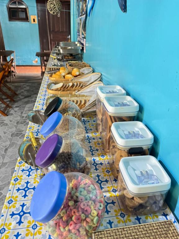 Um restaurante ou outro lugar para comer em Pousada & Camping Tubarão