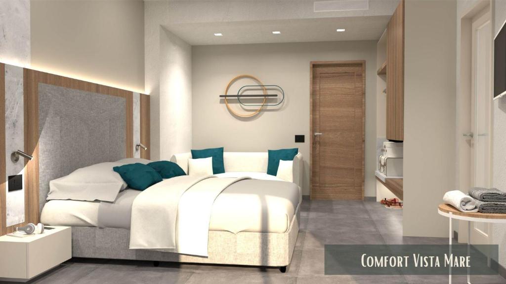 Postel nebo postele na pokoji v ubytování Hotel Miramare Chioggia Sottomarina