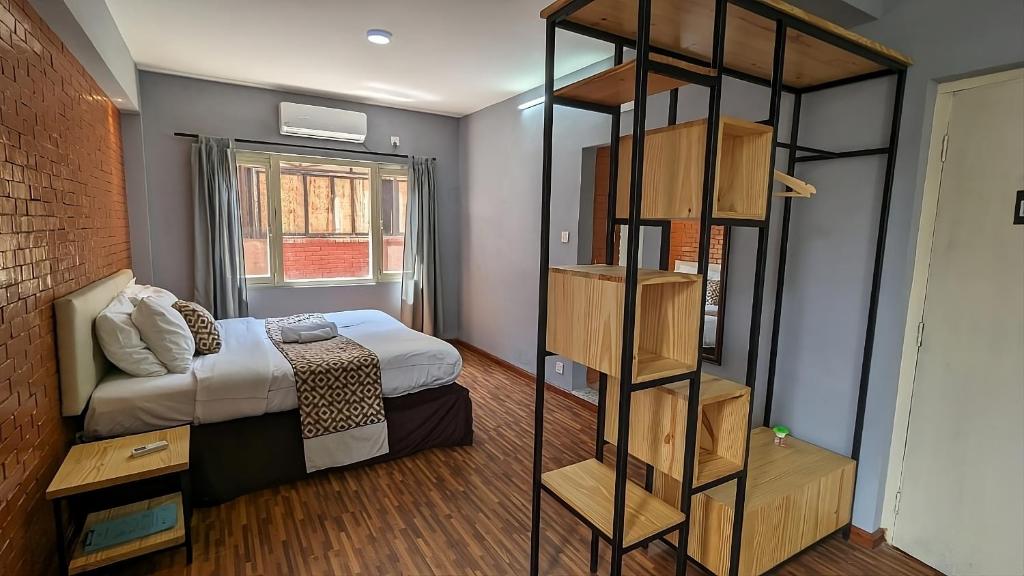 Postel nebo postele na pokoji v ubytování Nyadha House Bed & Breakfast