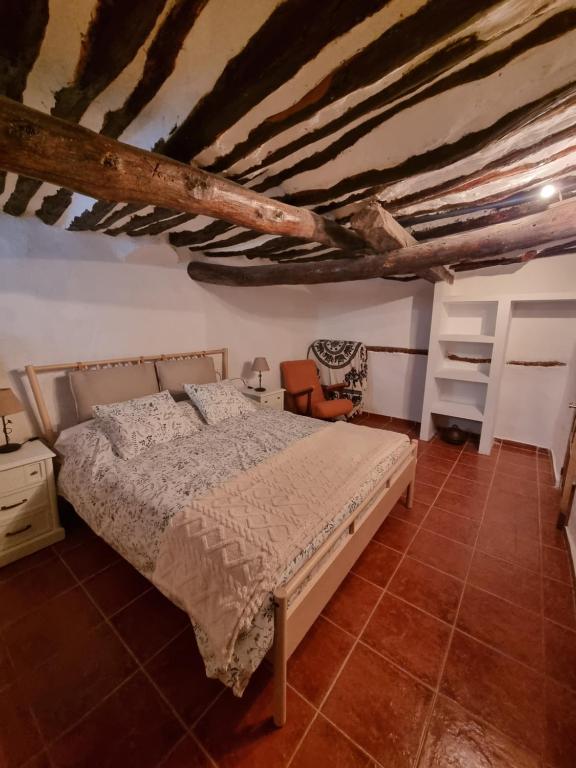 a bedroom with a bed in a room at Casa el Mirador de Moratalla in Moratalla