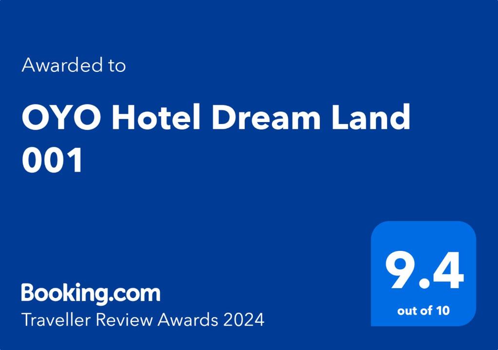 メーラトにあるOYO Hotel Dream Land 001のオクソホテルの夢の地を読む青い看板