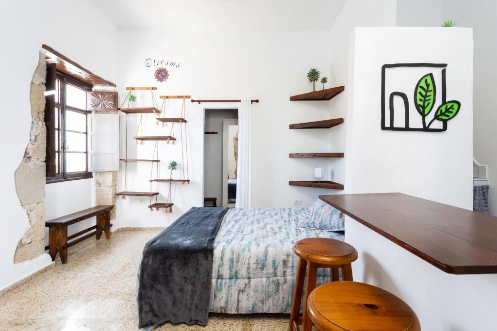Postel nebo postele na pokoji v ubytování El Hostal del Cubo