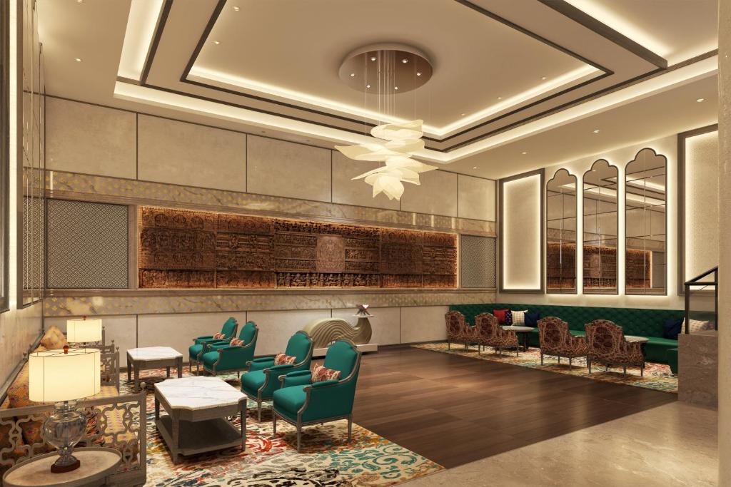 a rendering of a lobby with green chairs and tables at Ekante Bliss Tirupati - IHCL SeleQtions in Tirupati