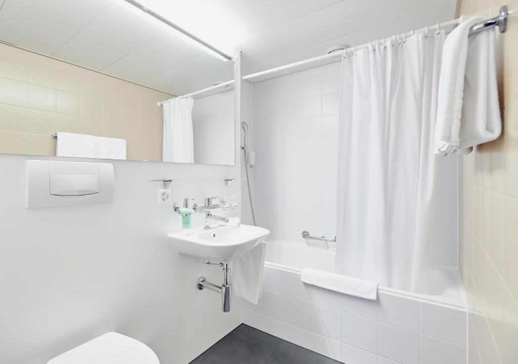 Koupelna v ubytování Hotel Schiff am Rhein