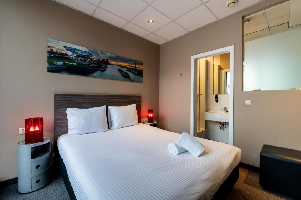 Postel nebo postele na pokoji v ubytování Hotel Docklands