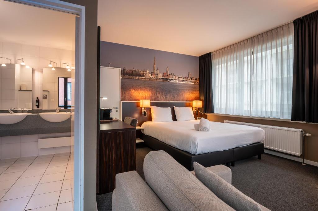 Postel nebo postele na pokoji v ubytování Hotel Docklands