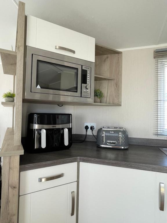 Kuchyň nebo kuchyňský kout v ubytování Fairview Caravan Hire