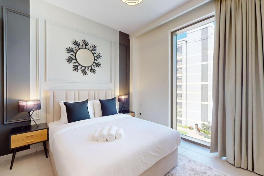 Postel nebo postele na pokoji v ubytování Summer at Creek Beach - Calm One Bedroom