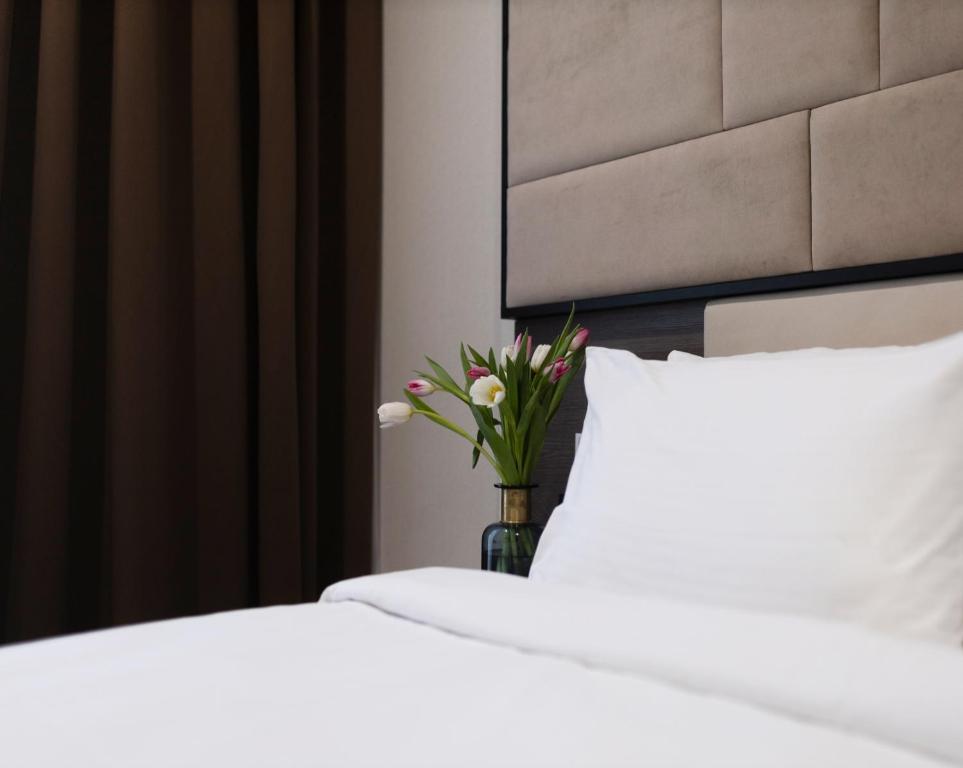 Postel nebo postele na pokoji v ubytování Ribas Rooms Odesa
