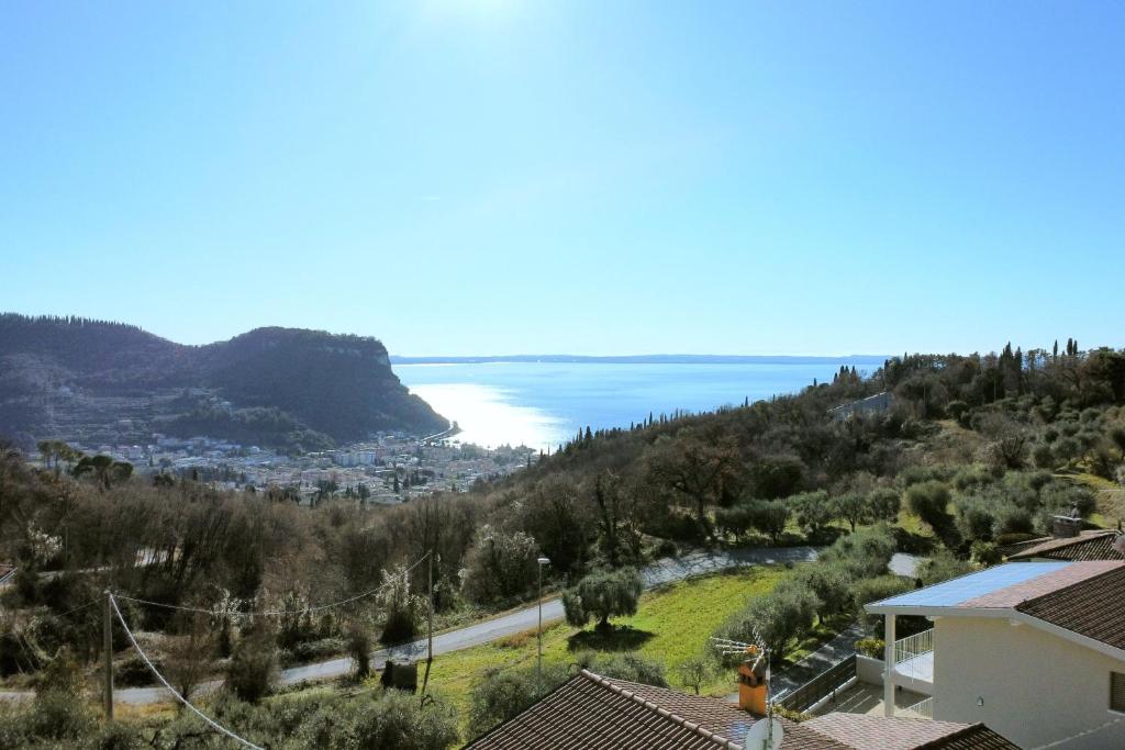 a view of the ocean from a house at Ca' Dei Cedri in Marciaga in Costermano